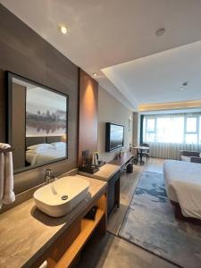 Aurea Central Hotel客房内的一张或多张床位