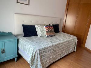A bed or beds in a room at La Minilla Suite