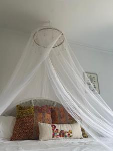 A bed or beds in a room at Ca Olivar