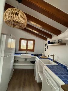 A kitchen or kitchenette at Ca Olivar