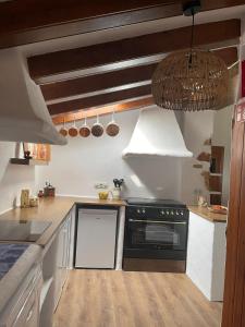 A kitchen or kitchenette at Ca Olivar