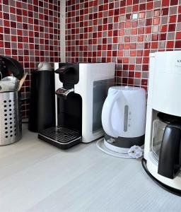 Příslušenství pro přípravu čaje a kávy v ubytování Kleine Strandpiraten