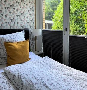 Postel nebo postele na pokoji v ubytování Kleine Strandpiraten