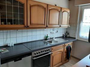 Kuchyň nebo kuchyňský kout v ubytování Gierske Wohnung + 9 fotografií