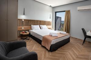 Postel nebo postele na pokoji v ubytování Galaxy Hotel