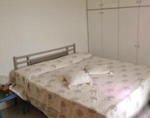 Ein Bett oder Betten in einem Zimmer der Unterkunft Le case di Recco by Holiday World
