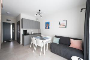 Kuchyň nebo kuchyňský kout v ubytování MEDUSA apartamenty i bungalowy