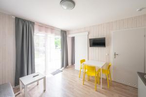 TV a/nebo společenská místnost v ubytování MEDUSA apartamenty i bungalowy