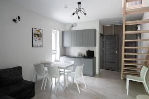 Kuchyň nebo kuchyňský kout v ubytování MEDUSA apartamenty i bungalowy