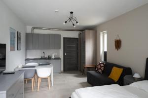 Postel nebo postele na pokoji v ubytování MEDUSA apartamenty i bungalowy