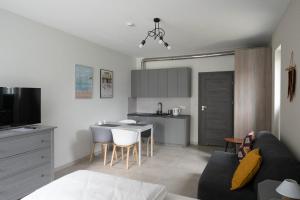 Kuchyň nebo kuchyňský kout v ubytování MEDUSA apartamenty i bungalowy