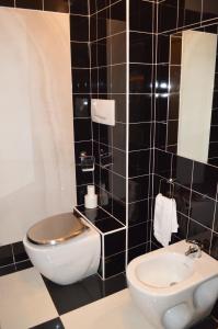 Koupelna v ubytování Hotel Torvaianica