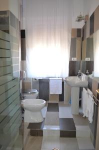 Koupelna v ubytování Hotel Torvaianica