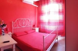 Postel nebo postele na pokoji v ubytování Hotel Torvaianica