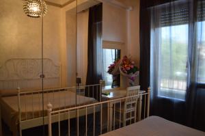 Postel nebo postele na pokoji v ubytování Hotel Torvaianica