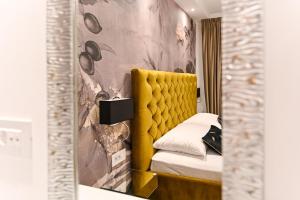 Posteľ alebo postele v izbe v ubytovaní Apartments An & Lu with Rooftop Jacuzzi