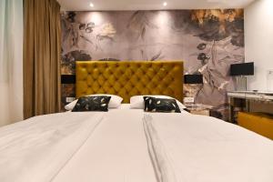 Posteľ alebo postele v izbe v ubytovaní Apartments An & Lu with Rooftop Jacuzzi