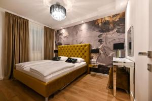 Posteľ alebo postele v izbe v ubytovaní Apartments An & Lu with Rooftop Jacuzzi + 37 fotografií