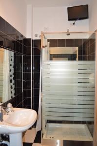 Koupelna v ubytování Hotel Torvaianica