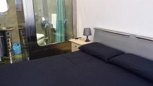 Postel nebo postele na pokoji v ubytování Hotel Torvaianica