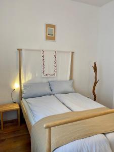 Postel nebo postele na pokoji v ubytování Kläve12 Guesthouse