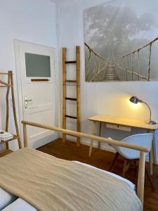 Postel nebo postele na pokoji v ubytování Kläve12 Guesthouse