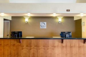 a kitchen with a large mirror and a counter top at Sleep Inn & Suites Bakersfield North in Bakersfield
