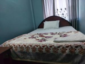 Postel nebo postele na pokoji v ubytování Hotel Quality