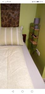 Llit o llits en una habitació de Bagolyvár vendégház