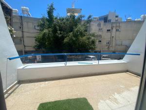 a view from the balcony of a building at 1-bedroom duplex 100m by the sea in Limassol