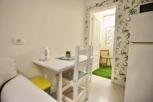 Kuchyň nebo kuchyňský kout v ubytování Sweet Home Apartaments