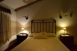 Un pat sau paturi într-o cameră la Puerto Roque Turismo Rural