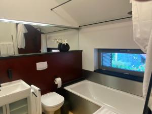 Vonios kambarys apgyvendinimo įstaigoje Atelier Tiedemann