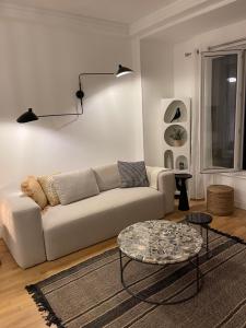 Posedenie v ubytovaní Appartement Le Palais du Commerce