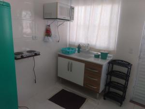 Gallery image of Loft01 com garagem, Wi-fi, 25 min de Aparecida in Pindamonhangaba +23 photos