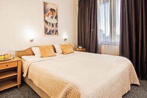 Postel nebo postele na pokoji v ubytování Mini-Hotel Kyivskyі