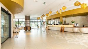 a lobby of a building with a reception desk at Hapimag Resort Marbella in Marbella
