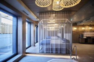 Postel nebo postele na pokoji v ubytování SOULSISTERS' Hotel 4 Sterne Superior