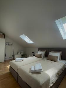 Postel nebo postele na pokoji v ubytování Alba Apartment