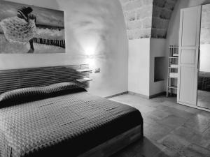 A bed or beds in a room at Le radici Még 13 kép