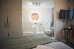 Ein Badezimmer in der Unterkunft Hotel in Herrenhausen