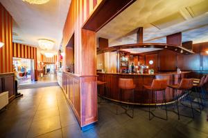 Posezení v ubytování Bastion Hotel Apeldoorn Het Loo