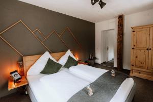Posteľ alebo postele v izbe v ubytovaní Das Schutzhaus-Bed and Breakfast-Dein Basislager im Salzkammergut