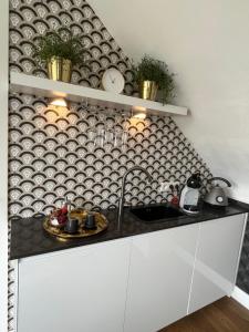 Kuchyň nebo kuchyňský kout v ubytování Rooftop terrace suite + 12 fotografií