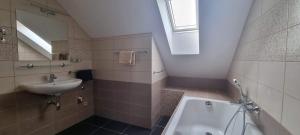 Kúpeľňa v ubytovaní Apartmány Adieu 2