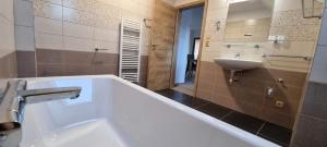 Kúpeľňa v ubytovaní Apartmány Adieu 2