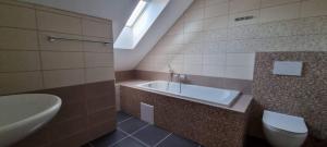 Kúpeľňa v ubytovaní Apartmány Adieu 2