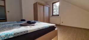 Posteľ alebo postele v izbe v ubytovaní Apartmány Adieu 2