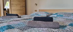Posteľ alebo postele v izbe v ubytovaní Apartmány Adieu 2