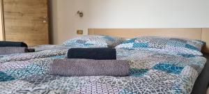 Posteľ alebo postele v izbe v ubytovaní Apartmány Adieu 2